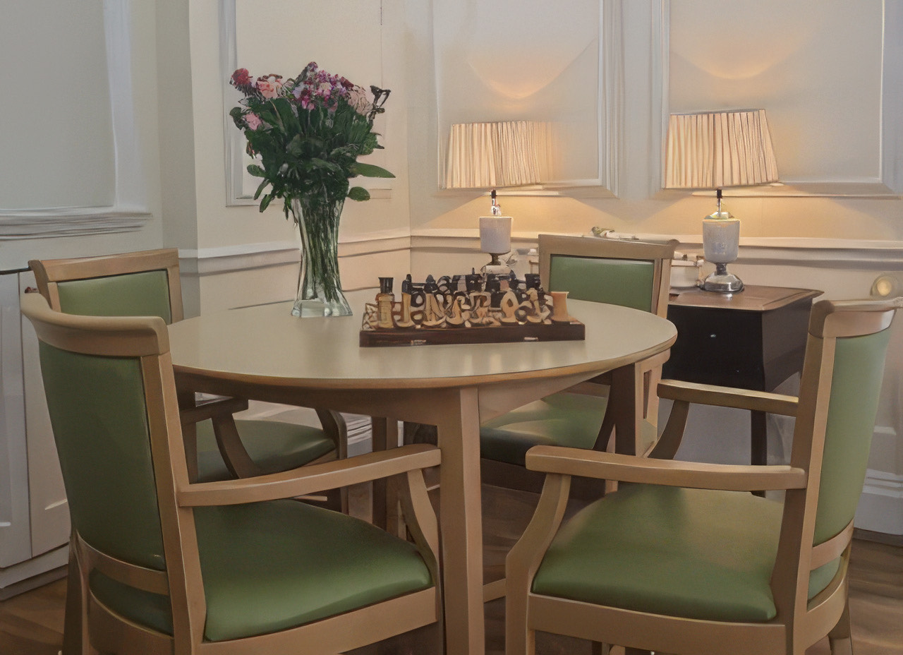 A dining table set with fresh flowers
